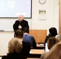 Абатуров в аудитории на конференции по стандартам НОСТРОЙ в качестве основного докладчика